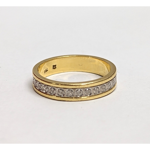 582 - An 18ct gold ring. 3.7g. Size UK J.