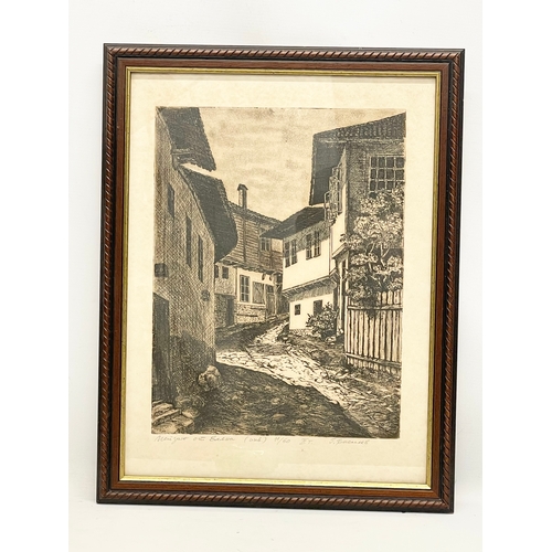 599 - An early 20th century French etching. Signed. 39x49.5cm