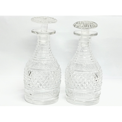 604 - A pair of large good quality early 20th century Georgian style crystal decanters. 25cm