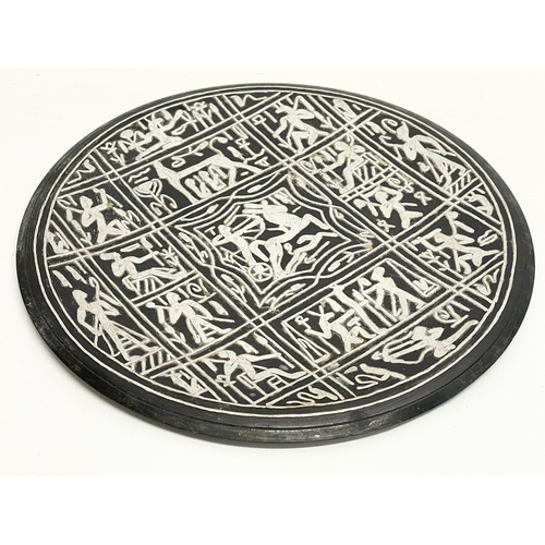 64 - A pair of late 19th century silver plated inlaid copper trays. 25cm