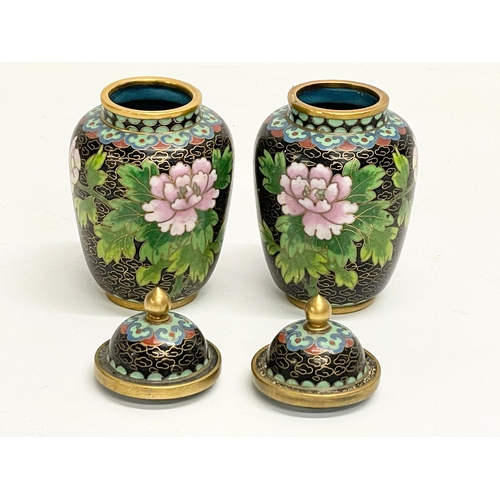 725 - A pair of small cloisonné pots with lids. 11cm.