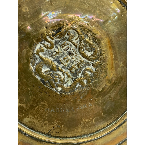 727 - A late 19th/early 20th century Chinese brass tray. 31cm.