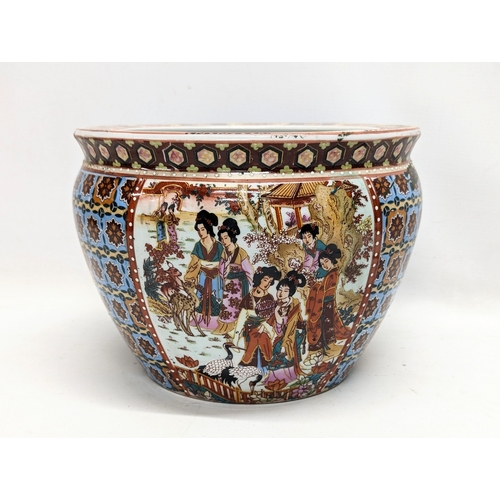 703 - A Chinese pottery jardiniere. 27x19.5cm