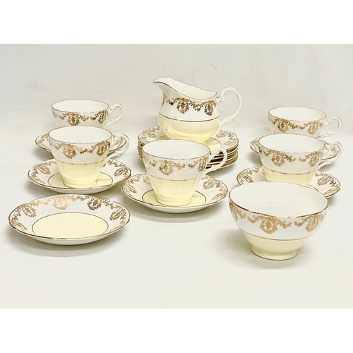 706 - A 19 piece Imperial tea set. 22k gold warranted.