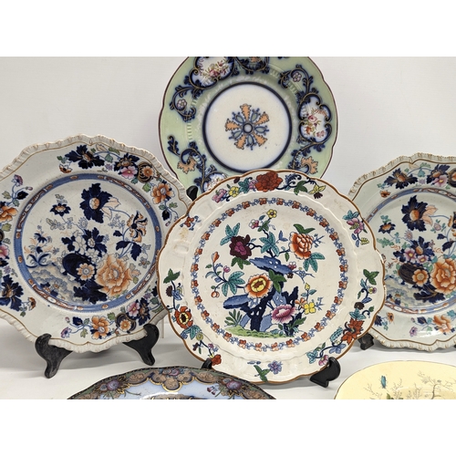 731 - A quantity of 19th century pottery plates.