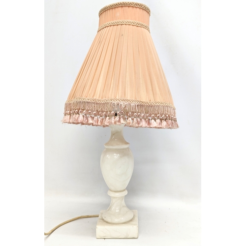 708 - An onyx table lamp. 59cm