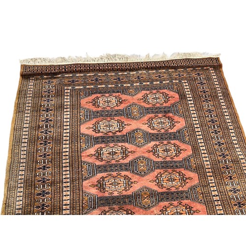 1031 - A good quality vintage hand knotted Middle Eastern rug.  
27x190cm