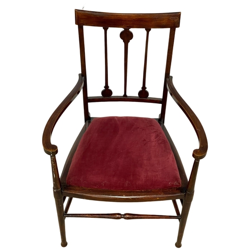 1009 - An Edwardian armchair.