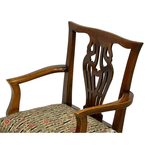 1010 - A late 19th century Chippendale style Elm and Beech armchair.