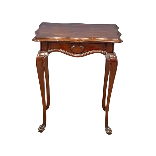 1014 - A good quality vintage mahogany side table on ball & claw feet. 66x52x79cm