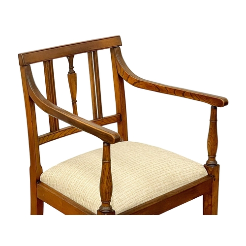 1024 - A Georgian Elm and Beech armchair. Circa 1810-1820.