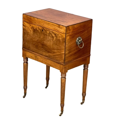 1026 - A George IV mahogany Cellarette. Circa 1820. 49x32x76cm