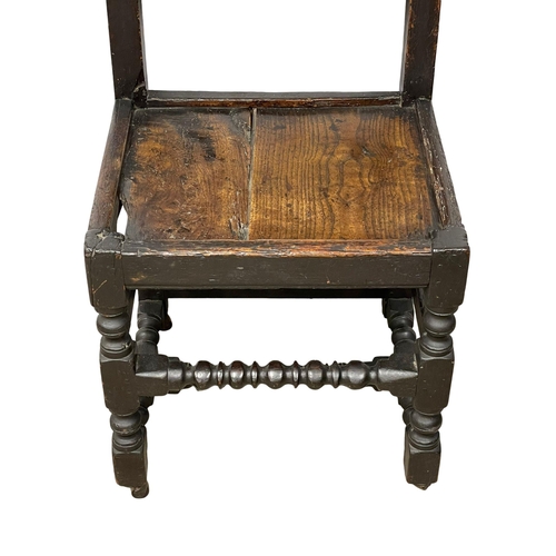 1028 - A Charles II oak side chair. Circa 1660-1680.