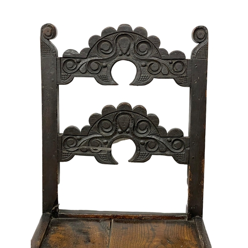 1028 - A Charles II oak side chair. Circa 1660-1680.