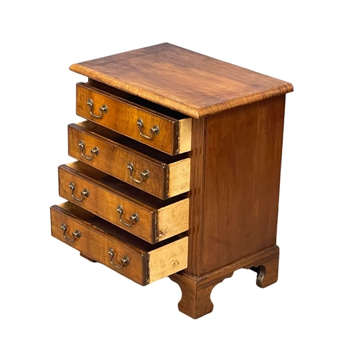 1048 - A small good quality Georgian style chest of drawers on bracket feet.  55x37x63cm