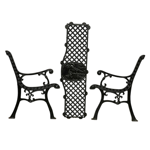 260C - A pair of cast iron garden bench ends and back