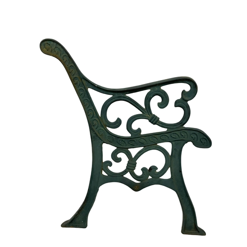 288 - A pair of large cast iron garden bench ends. 71x77cm