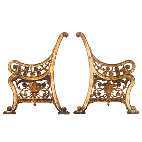 324 - A pair of large Victorian cast iron garden bench ends. 72x88.5cm