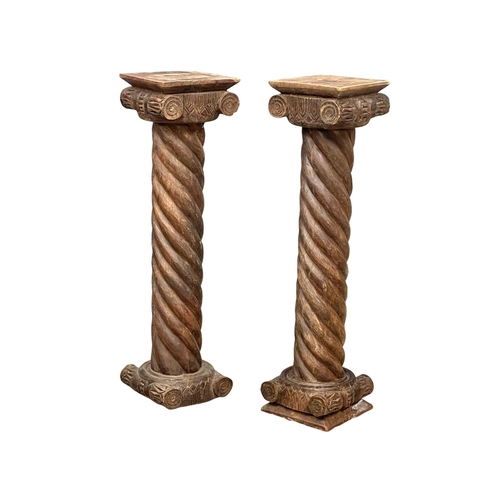 48 - A pair of 19th century pillars. 23x24x90.5cm