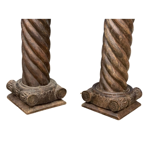 48 - A pair of 19th century pillars. 23x24x90.5cm