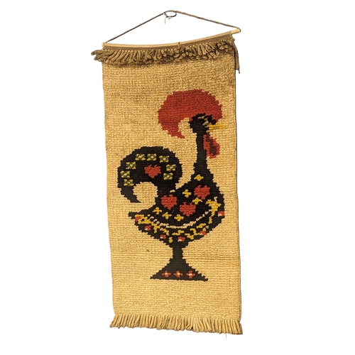 649 - A vintage wool work wall hanging. 62.5x142cm