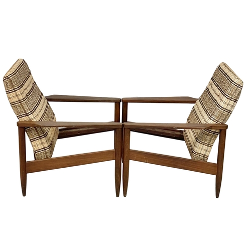 803 - A pair of Mid Century teak armchairs designed by Arthur Edwards for Crannac. Republic of Ireland 196... 