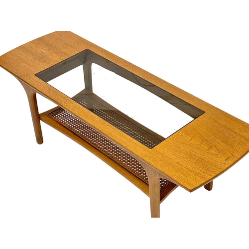 804 - A McIntosh Mid Century teak 2 tier coffee table with glass top. 1970’s. 120x41x40cm