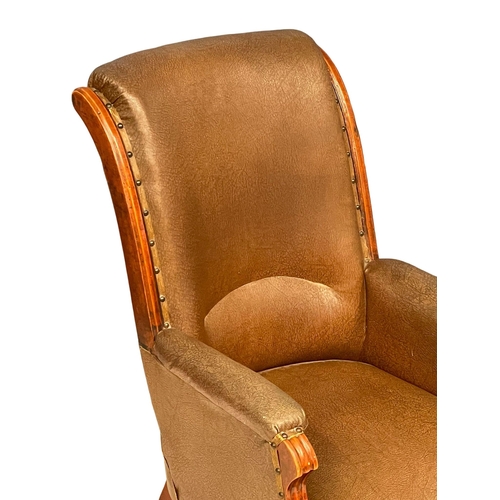 805 - A Victorian gents armchair with vintage leather. Circa 1880.