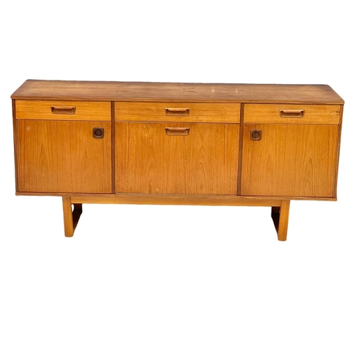 810 - A Mid Century teak sideboard. 1960’s. 160x43.5x75.5cm