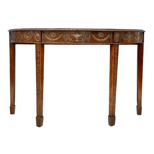 818 - A late 19th century mahogany Adams style demi-loon side table. Circa 1880. 118x54x74cm