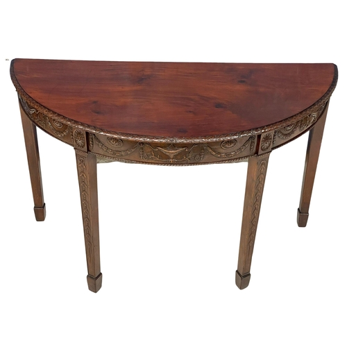 818 - A late 19th century mahogany Adams style demi-loon side table. Circa 1880. 118x54x74cm