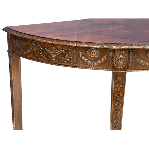 818 - A late 19th century mahogany Adams style demi-loon side table. Circa 1880. 118x54x74cm