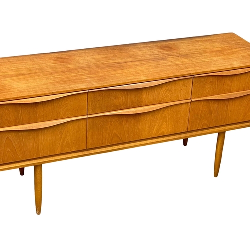 821 - A Mid Century teak 6 drawer sideboard designed by Frank Guille for Austinsuite. 1960’s. 145x42.5x66c... 