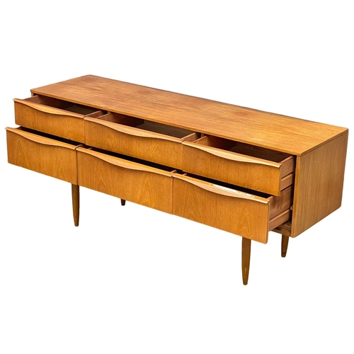 821 - A Mid Century teak 6 drawer sideboard designed by Frank Guille for Austinsuite. 1960’s. 145x42.5x66c... 