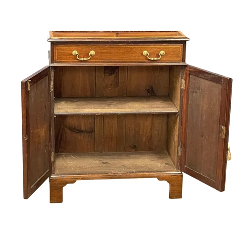 824 - A late 19th century Sheraton Revival inlaid mahogany bookcase. Circa 1880-1890. 76x39x200cm