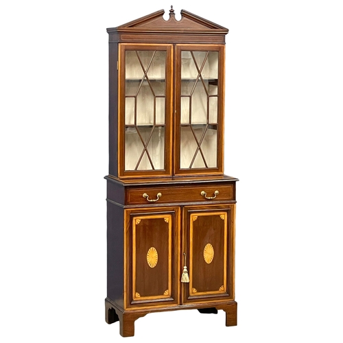 824 - A late 19th century Sheraton Revival inlaid mahogany bookcase. Circa 1880-1890. 76x39x200cm