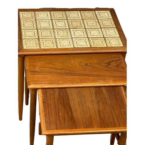 825 - A Danish Mid Century teak nest of tables. 1960’s