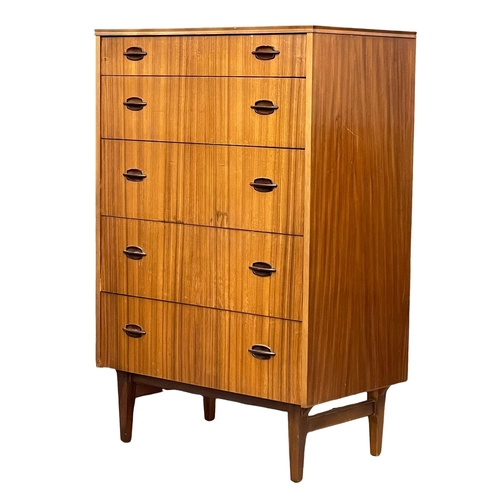 833 - A Mid Century Tola wood tallboy chest of drawers by Elliots of Newbury with simulated rosewood handl... 