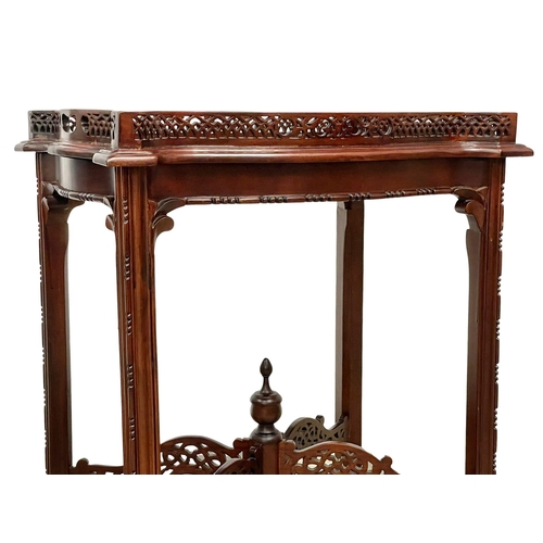 840 - A pair of Chinese Chippendale Revival mahogany silver tables. 59x43x70.5cm