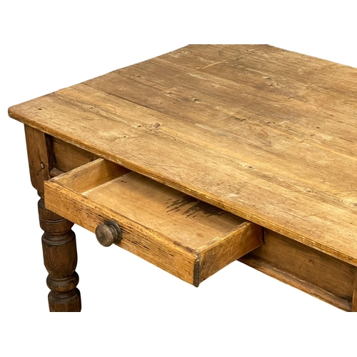 841 - A Victorian pine Farmhouse kitchen table with drawer. Circa 1880. 121.5x86x73cm