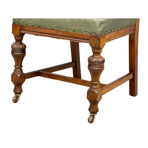 846 - A Victorian carved oak high back desk chair. Circa 1880.