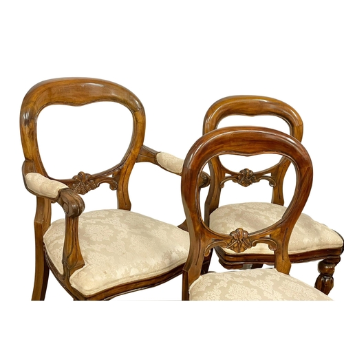 852 - A set of 6 Victorian style mahogany balloon back dining chairs, including 2 carvers.