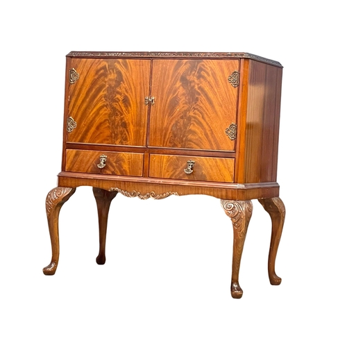 854 - A Georgian style mahogany cocktail cabinet. 92x50x97cm