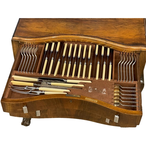 858 - A vintage Georgian style walnut cutlery chest with good quality silver plate. 69x50x75cm