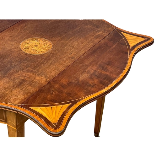 861 - An excellent quality early 20th century Sheraton Revival inlaid mahogany drop leaf table with drawer... 