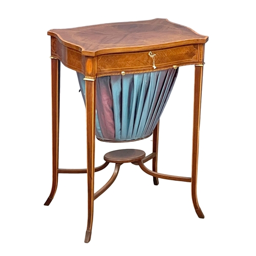 862 - An excellent quality early 20th century Sheraton Revival inlaid mahogany sewing side table with bras... 