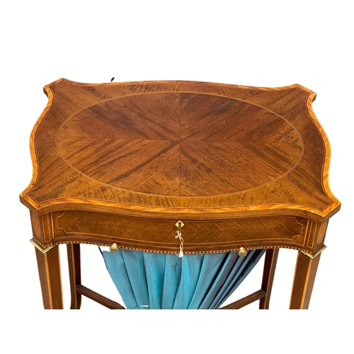 862 - An excellent quality early 20th century Sheraton Revival inlaid mahogany sewing side table with bras... 