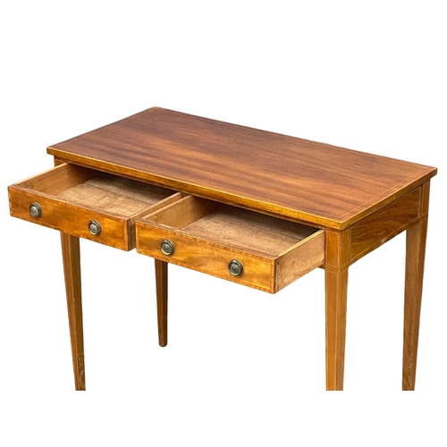 863 - An early 20th century Sheraton Revival inlaid mahogany side table with 2 drawers. Circa 1900-1910. 9... 