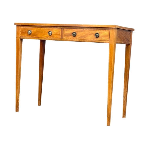 863 - An early 20th century Sheraton Revival inlaid mahogany side table with 2 drawers. Circa 1900-1910. 9... 