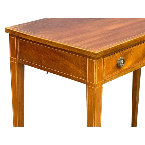 863 - An early 20th century Sheraton Revival inlaid mahogany side table with 2 drawers. Circa 1900-1910. 9... 